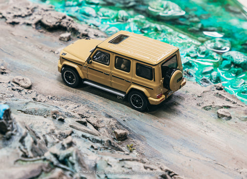 Load image into Gallery viewer, Tarmac Works 1/64 Mercedes-AMG G 63 Brown Model Car
