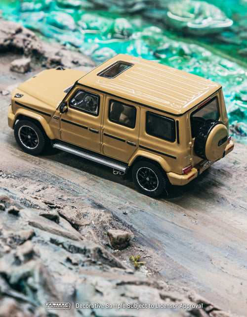 Load image into Gallery viewer, Tarmac Works 1/64 Mercedes-AMG G 63 Brown Model Car
