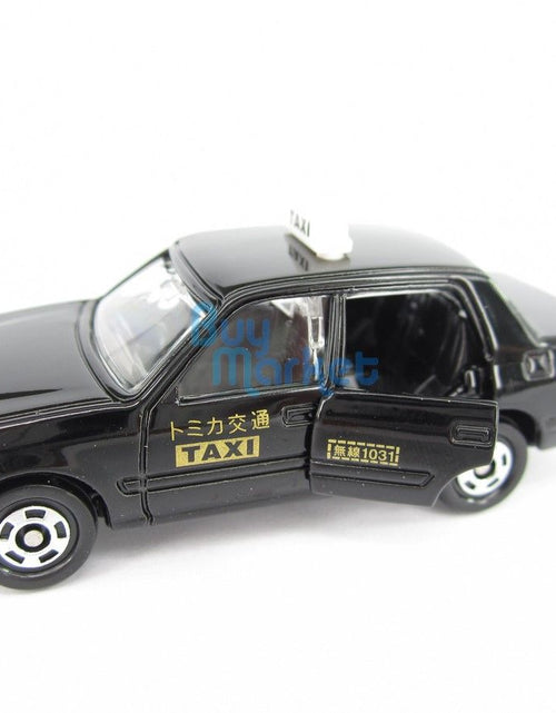 Load image into Gallery viewer, Takara Tomy Tomica #51 Toyota Crown Comfort Japan Taxi Sca. 1/63 Diecast Toy Car
