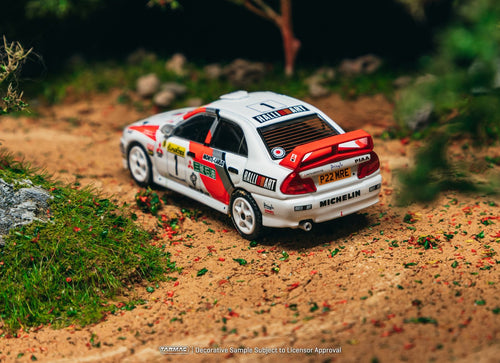Load image into Gallery viewer, Tarmac Works Mitsubishi Lancer Evolution IV Rallye Monte-Carlo 1997
