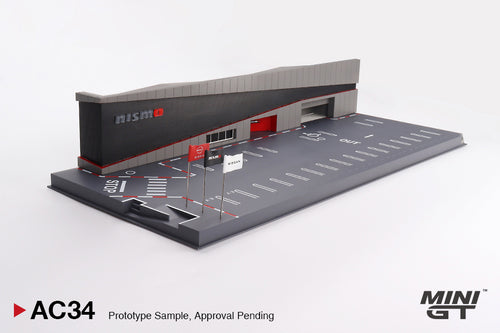 Load image into Gallery viewer, Mini GT 1/64 Diorama: NISSAN MOTORSPORTS &amp; CUSTOMIZING CO.,LTD NISMO
