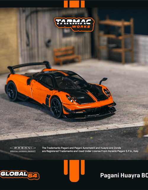 Load image into Gallery viewer, Tarmac Works 1/64 Pagani Huayra BC Arancio Saint Tropez Model Car
