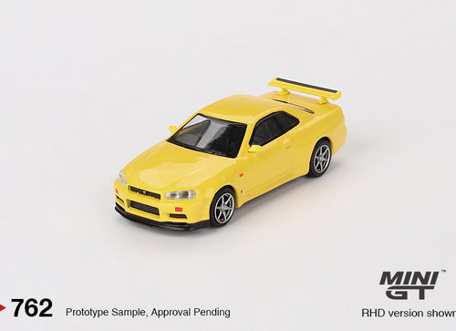 Load image into Gallery viewer, Mini GT #762 Nissan Skyline GT-R R34 Vspec Lighting Yellow (RHD)
