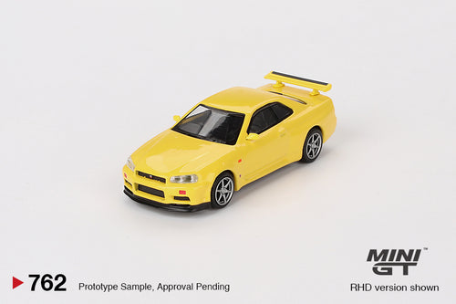 Load image into Gallery viewer, Mini GT #762 Nissan Skyline GT-R R34 Vspec Lighting Yellow (RHD)

