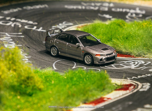 Load image into Gallery viewer, Tarmac Works Mitsubishi Lancer GSR Evolution IV Silver Diecast Model
