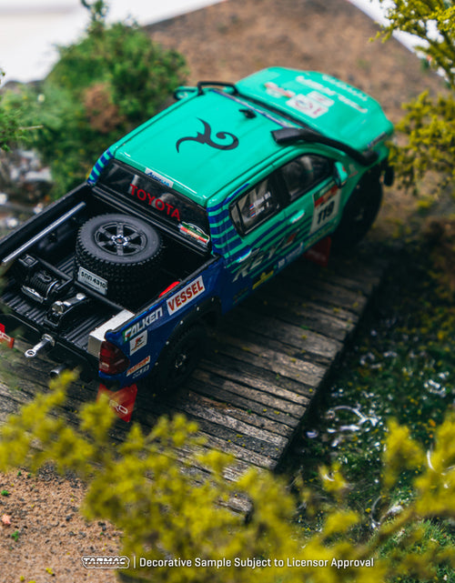 Load image into Gallery viewer, Tarmac Works 1/64 Toyota Hilux AXCR 2017 Diecast Model Car
