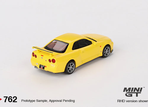 Load image into Gallery viewer, Mini GT #762 Nissan Skyline GT-R R34 Vspec Lighting Yellow (RHD)
