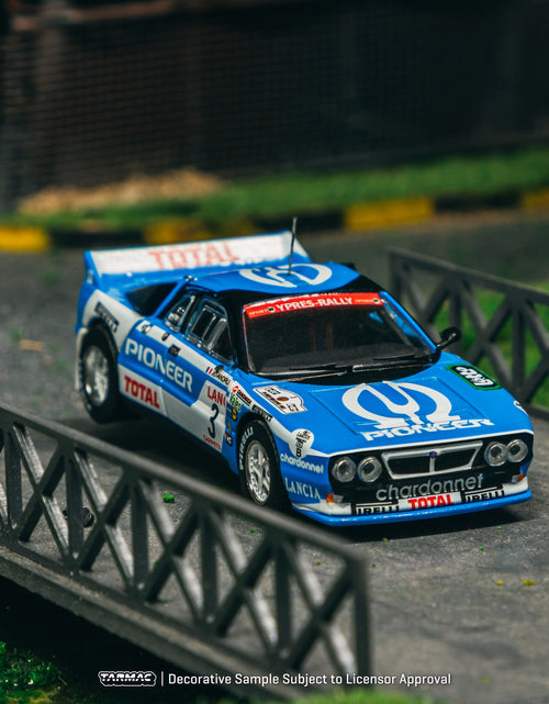 Load image into Gallery viewer, Tarmac Works 1/64 Lancia 037 Rally Ypres 24 Hours Rally 1983 Model
