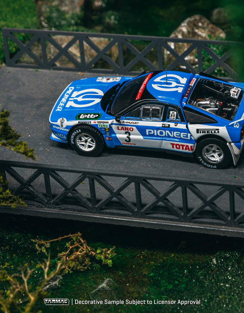 Load image into Gallery viewer, Tarmac Works 1/64 Lancia 037 Rally Ypres 24 Hours Rally 1983 Model

