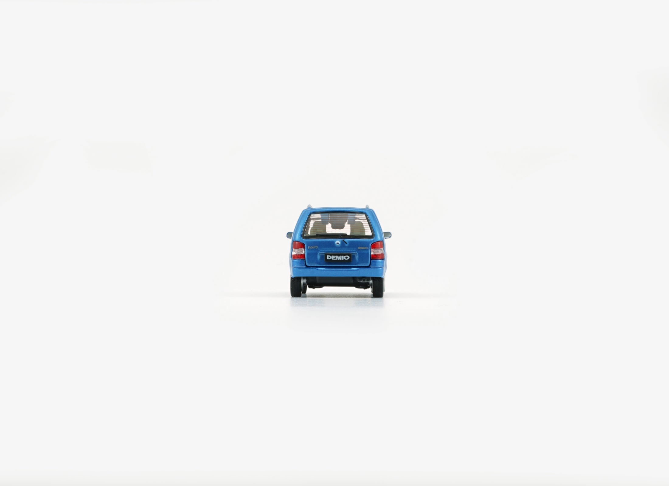 BMC 1/64 Mazda 1994 Demio (Metro) - Blue (RHD) Model with figures