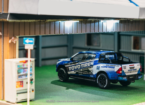 Load image into Gallery viewer, Tarmac Works 1/64 Toyota Hilux  Toyo Tires Diecast model car
