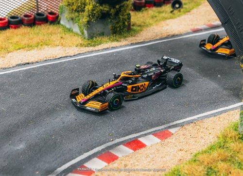 Load image into Gallery viewer, Tarmac Works 1/64 McLaren MCL36 Japanese Grand Prix 2022 Daniel
