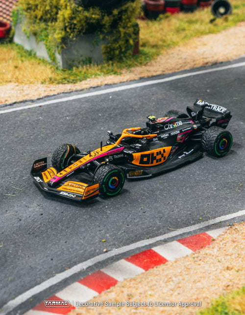 Load image into Gallery viewer, Tarmac Works 1/64 McLaren MCL36 Japanese Grand Prix 2022 Daniel
