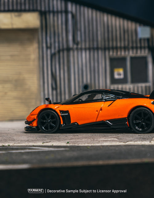 Load image into Gallery viewer, Tarmac Works 1/64 Pagani Huayra BC Arancio Saint Tropez Model Car
