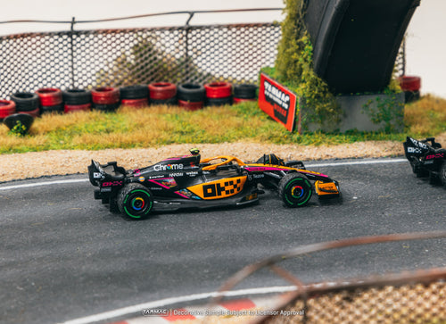 Load image into Gallery viewer, Tarmac Works 1/64 McLaren MCL36 Japanese Grand Prix 2022 Daniel
