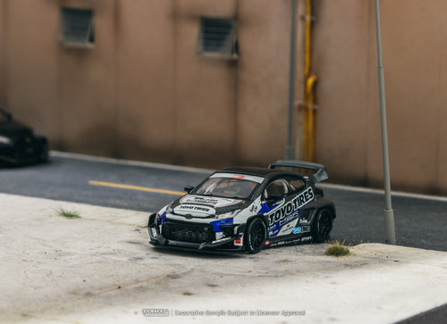Load image into Gallery viewer, Tarmac Works 1/64 Pandem Toyota GR Yaris TOYO TIRES Diecast Model

