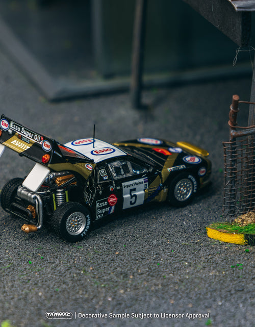 Load image into Gallery viewer, Tarmac Works 1/64 Lancia 037 Rally Rally Catalunya 1985 Diecast Car
