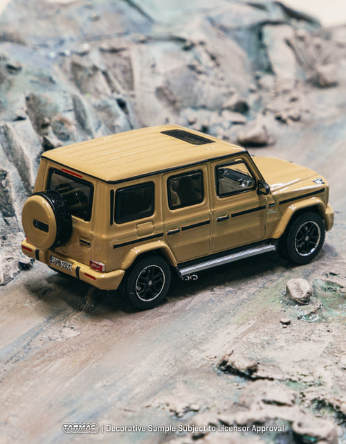 Load image into Gallery viewer, Tarmac Works 1/64 Mercedes-AMG G 63 Brown Model Car
