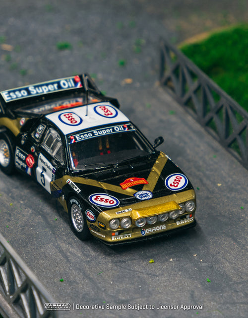 Load image into Gallery viewer, Tarmac Works 1/64 Lancia 037 Rally Rally Catalunya 1985 Diecast Car

